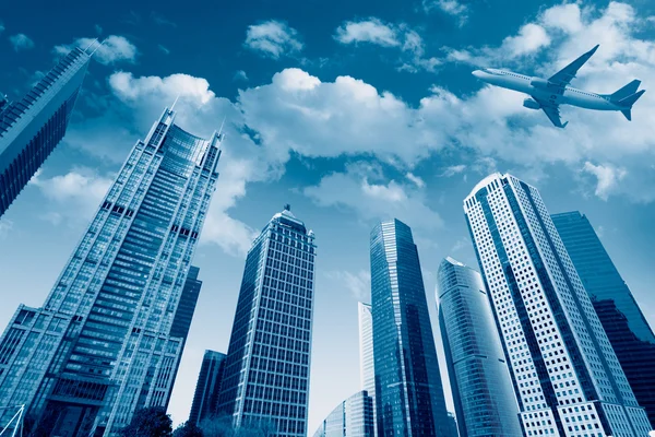 Airplane under the sky in shanghai Stock Image