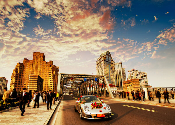 The wedding procession through bridge