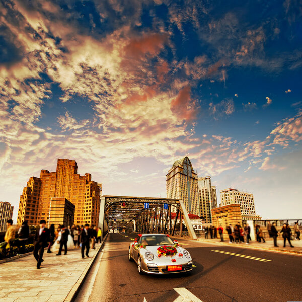 The wedding procession through bridge