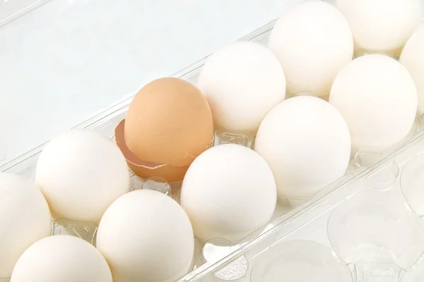 Broken egg shell in carton — Stock Photo, Image