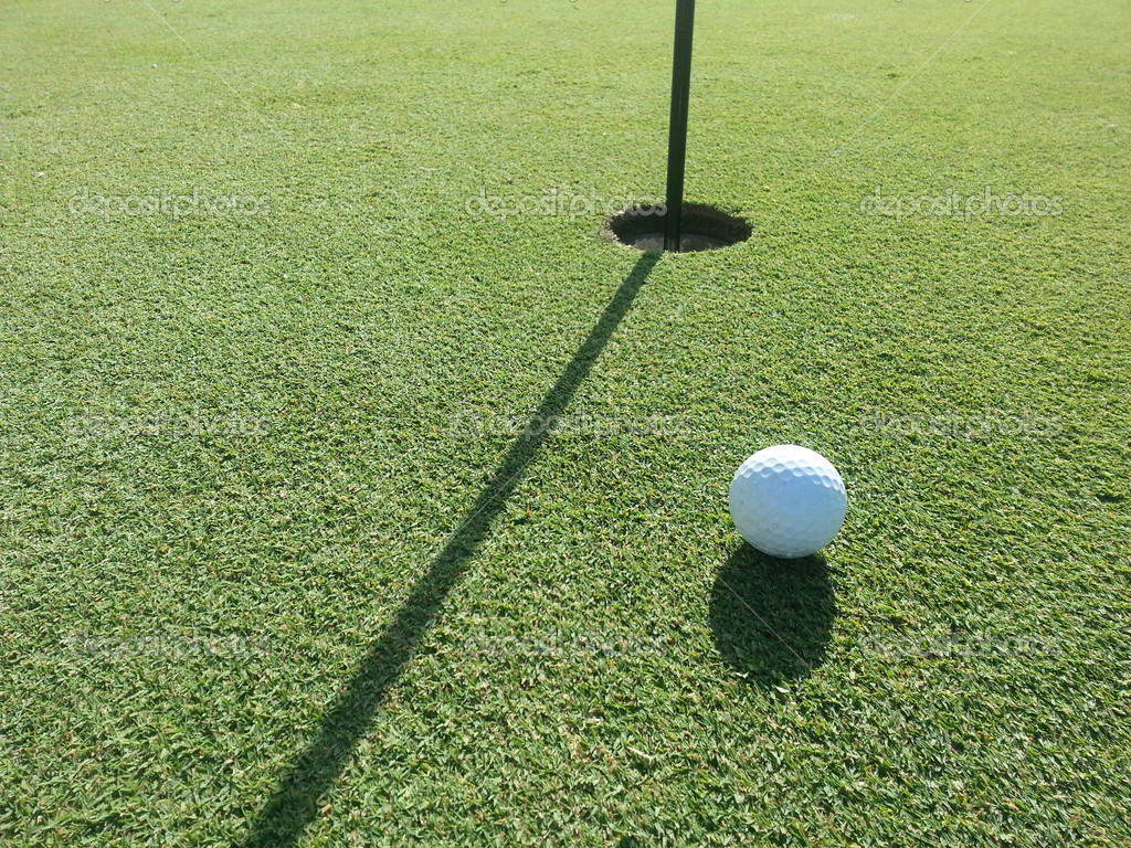 Golf Ball on the Green Stock Photo by 27218323