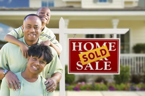 African American Family In Front of Real Estate Sign and House — Stock Photo, Image
