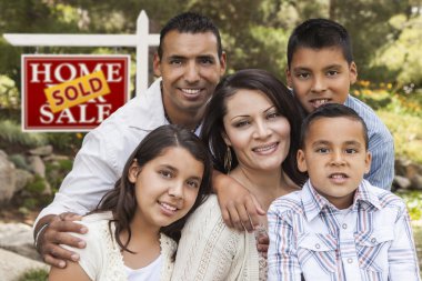 Hispanic Family in Front of Sold Real Estate Sign clipart
