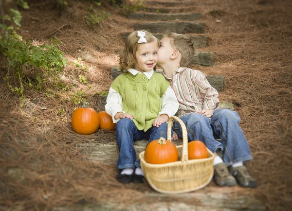 Brother and Sister Children on Wood Steps with Pumpkins Whisperi — Stock Photo, Image