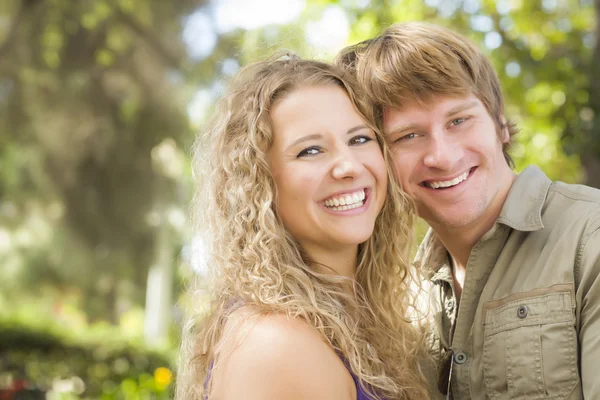 Attractive Loving Couple Portrait in the Park Royalty Free Stock Photos