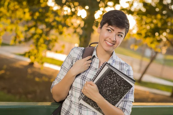 Retrato de una estudiante de raza mixta mirando hacia otro lado —  Fotos de Stock