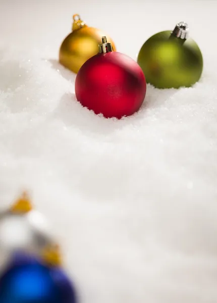 Christmas Ornaments on Snow Flakes with Text Room — Stock Photo, Image