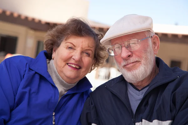 Happy Senior Adult Couple Bundled Up Outdoors Stock Image