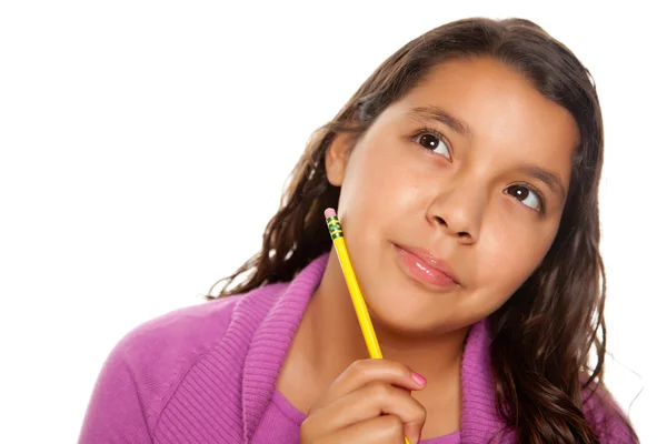 Menina bastante hispânica pensando com lápis — Fotografia de Stock