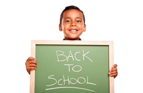 Schattige latino jongen houden schoolbord met terug naar school — Stockfoto