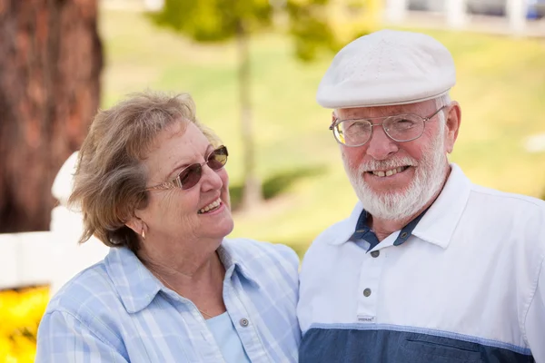 Happy Senior Couple in The Park Royalty Free Stock Images