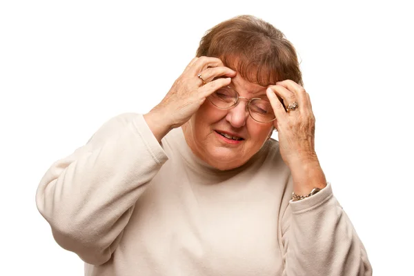 Seniorin mit schmerzhaftem Kopf auf weißem Grund — Stockfoto