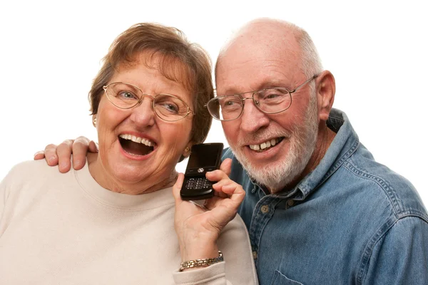 Casal Sênior feliz usando telefone celular no branco — Fotografia de Stock