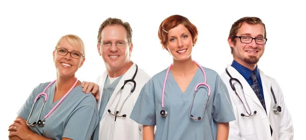 Skupina lékařů a sester na bílém pozadí — Stock fotografie