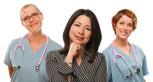 Испанская женщина с женщинами-врачами и медсестрами — стоковое фото