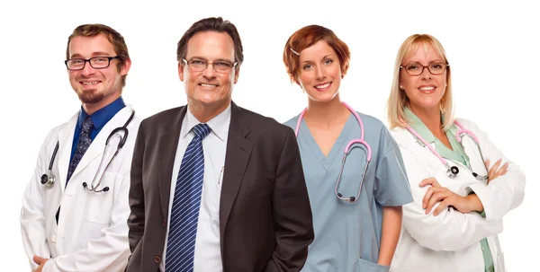 Smiling Businessman with Doctors and Nurses Stock Picture