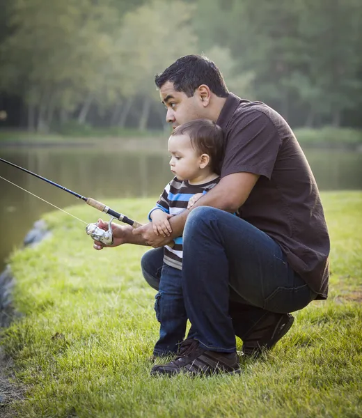 Happy Young Ethnic Father and Son Fishing — Stok fotoğraf