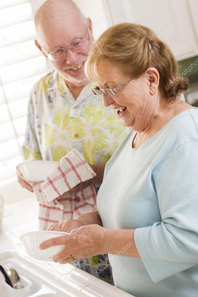 Mature Man Washing Dishes