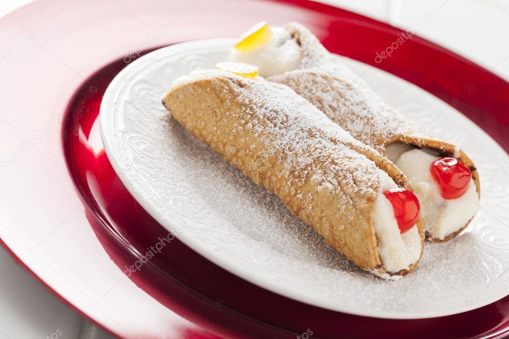 Two Tasty Cannoli on Plate
