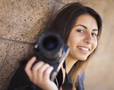 Mixed Race Young Adult Female Photographer Holding Camera clipart