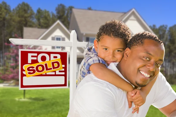 Mixed Race Father and Son In Front of Real Estate Sign and House — Stock Photo, Image