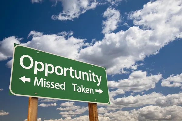 Opportunity Missed and Taken Green Road Sign and Clouds — Stock Photo, Image