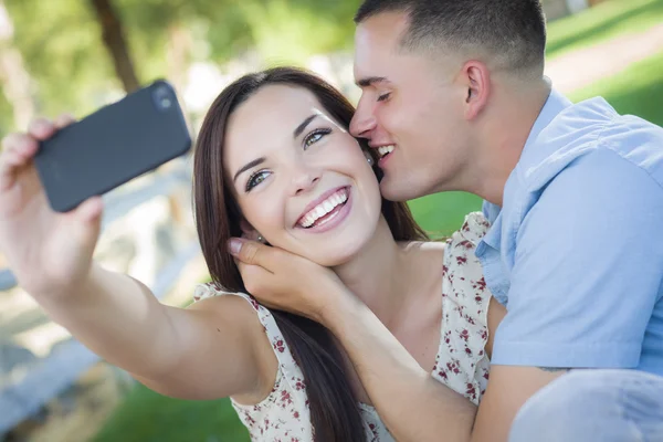Mixed Race Couple Taking Self Portrait in Park — Stock Photo, Image