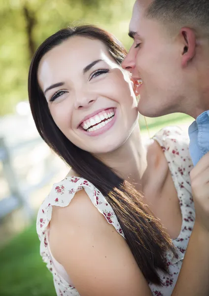 Mixed Race Romantic Couple Whispering in the Park — Stock Photo, Image