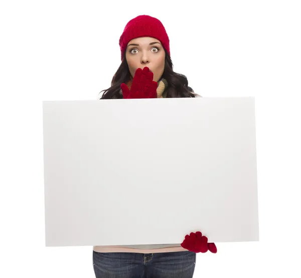 Stunned Girl Wearing Winter Hat and Gloves Holds Blank Sign — Stock Photo, Image