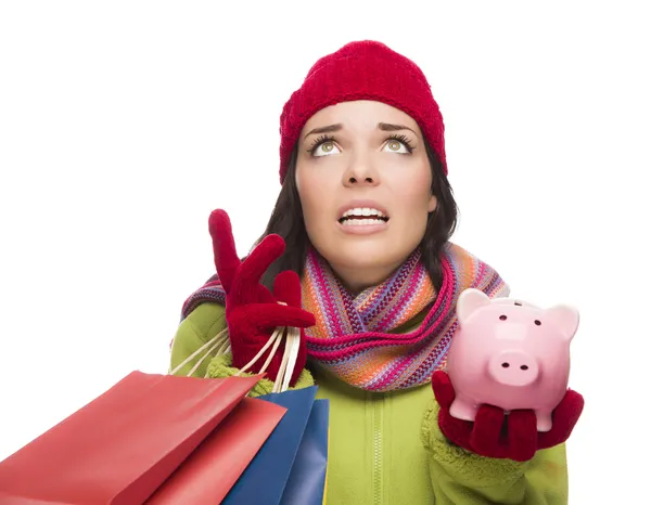 Stressed Mixed Race Woman Holding Shopping Bags and Piggybank — Stock Photo, Image