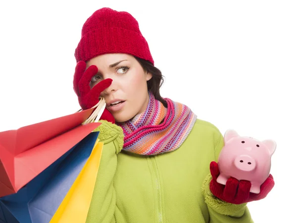 Érintett kifejező kevert nő gazdaság bevásárló táskák és — Stock Fotó