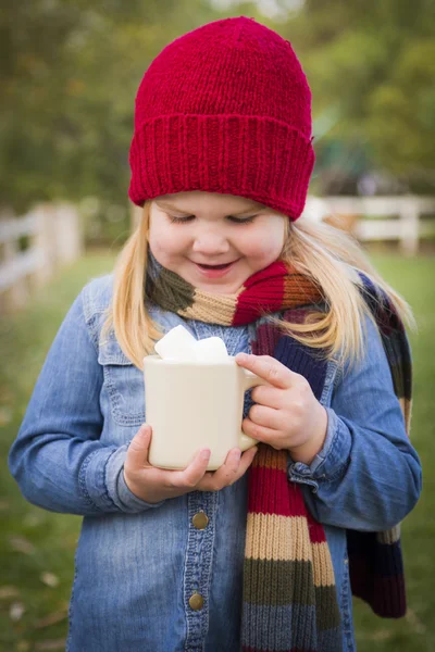 Cute Young Girl Holding Cocoa Mug with Marsh Mallows Outside — Stock Photo, Image