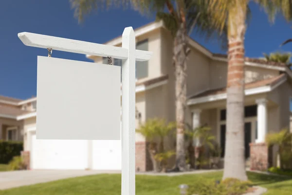 Blank Real Estate Sign in Front of New House — Stock Photo, Image