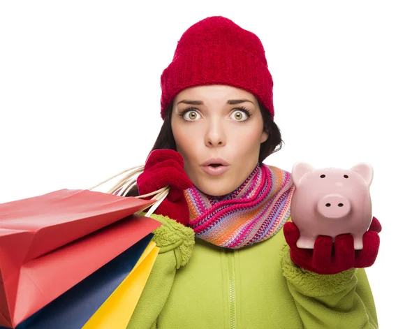 Concerned Mixed Race Woman Holding Shopping Bags and Piggybank — Stock Photo, Image