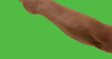 Male Using Paint Roller Two Strokes Across Green Screen.