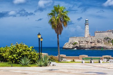 The castle of El Morro in Havana and a nearby park clipart