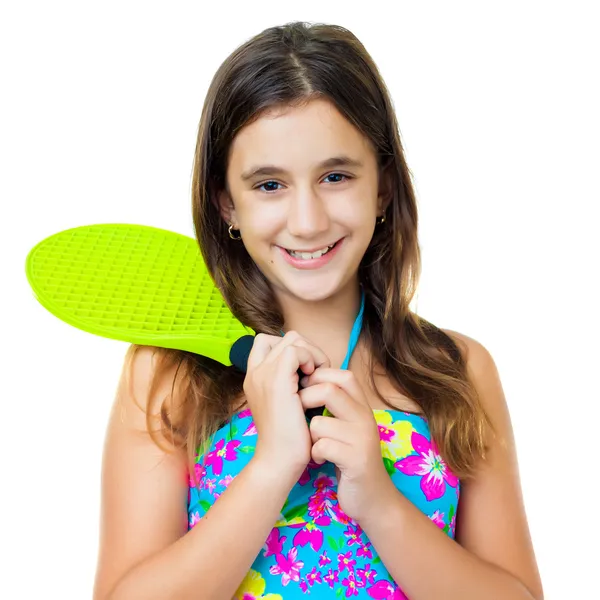 Hispanic girl holding a yellow racquet — Stock Photo, Image