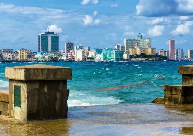 The skyline of Havana with a turbulent sea clipart