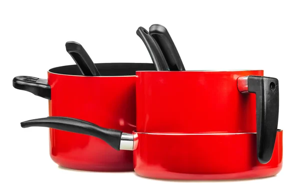 Червоні сковороди і горщики для приготування їжі — стокове фото