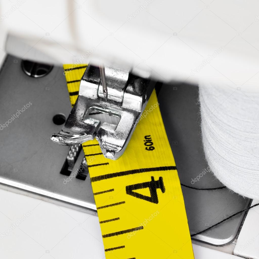 Sewing machine and yellow measuring tape