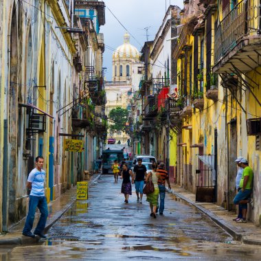 Cuban in an old neighborhood in Havana clipart