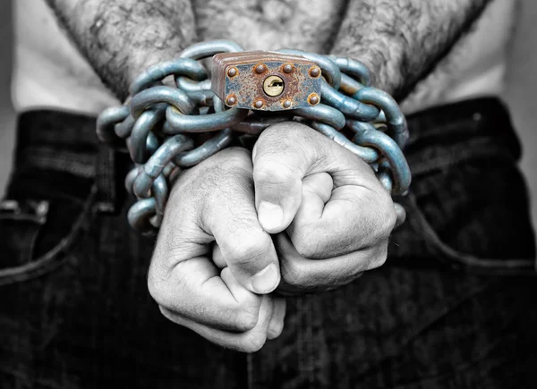 Man with his two hands chained — Stock Photo, Image