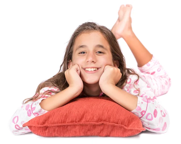 Девушка лежит на полу в пижаме — стоковое фото