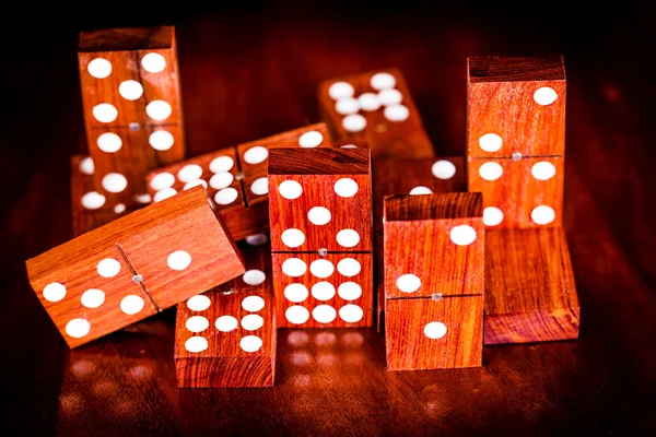 Game of dominoes with a dark background and reflections — Stock Photo, Image