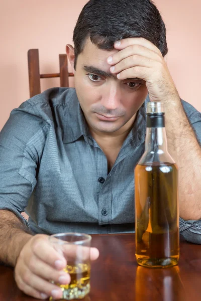 Depressed and drunk hispanic man — Stock Photo, Image