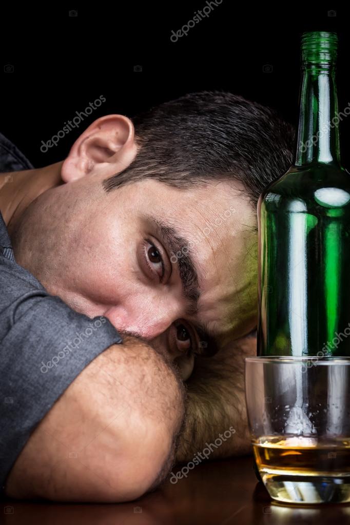 Drunk and depressed man drinking alone Stock Photo by ©kmiragaya 38591033 Drunk and depressed man drinking alone Stock Photo by ©kmiragaya 38591033