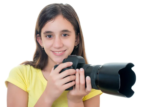 Mädchen mit einer professionellen Kamera isoliert auf weiß — Stockfoto