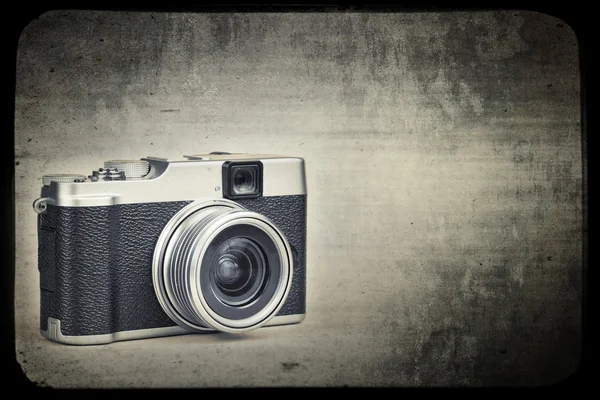 Vintage camera op een grunge achtergrond — Stockfoto