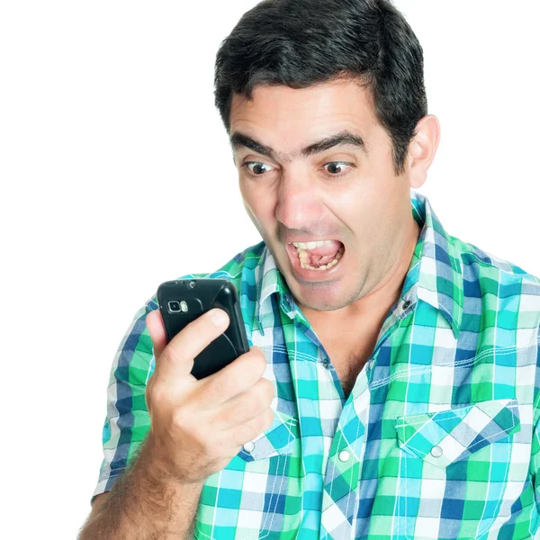 Close-up of an angry man yelling at his mobile phone — Stock Photo, Image