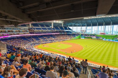 Fans watching a baseball game at the Miami Marlins Stadium clipart